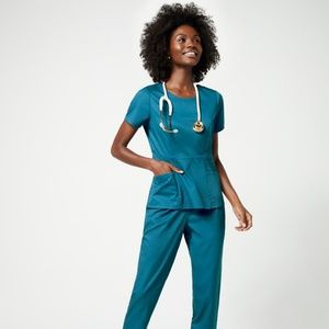 Jaanuu peplum scrub top
